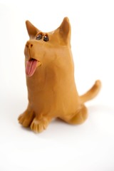 Plasticine handmade dog isolated on white