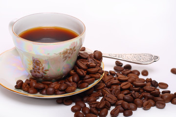 Coffee baens with a cup of coffee