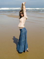 Woman dancing in the beach