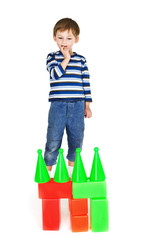 Child plays with color blocks