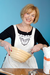 attractive older lady preparing food