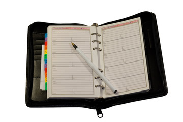 black leather pocket planner with pen isolated on white