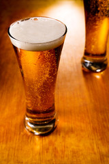 Two beer glasses, selective focus
