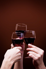 Fototapeta na wymiar glass of red wine in hand