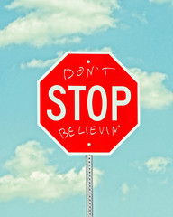 stop sign with graffiti