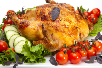 Whole roasted chicken on white