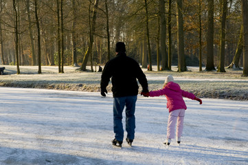 Father and daughter at the ice