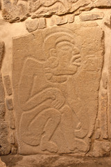 Ancient zapotec relief on the wall in Monte Alban, Mexico