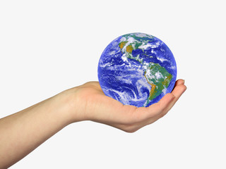 earth in woman's hand on white background