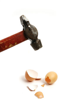 hammer cracking egg