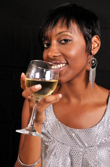 African American woman enjoying wine