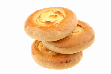 Tasty curd tarts on a white background