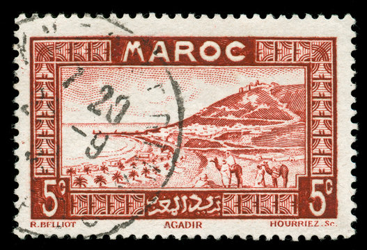 vintage stamp from Morocco depicting a traditional scenic view