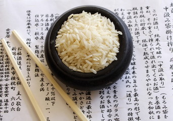 bowl of rice, japanese chopstics, japanese paper - obrazy, fototapety, plakaty