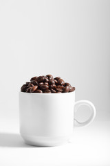 Coffee beans and cup