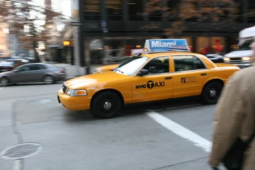 Acrylic prints Fast driving yellow cab (Taxi car) in Manhattan Soho in New York City, USA