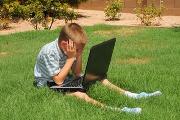 Boy With Laptop Computer