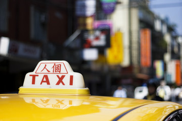 Taxi with Chinese writing on it