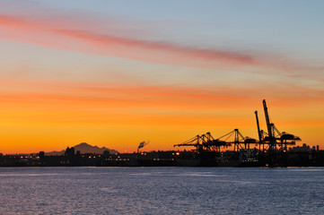 shipping crane and mt. baker at sunrise