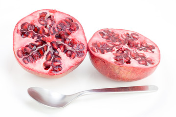 Fresh pomegrate with spoon