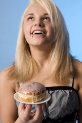 teenager with the doughnut on the plate