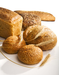 Fresh bread with ears of wheat