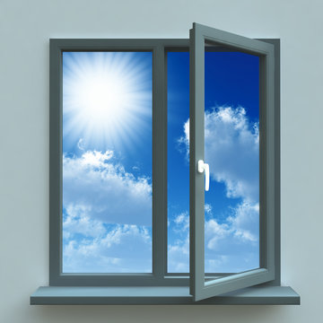 Open window against a blue wall and the cloudy sky and sun