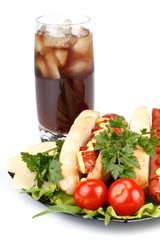 Hot dog with vegetables and cola