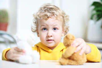 Kid with teddy