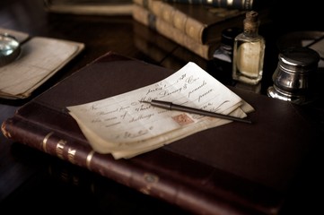 Paying Bills with pen and ink, sepia tone