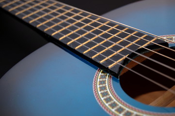 Fototapeta premium blue music guitar for playing party music
