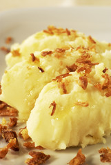 Mashed potato topped with browned onion