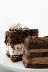 Two chocolate cakes on white background
