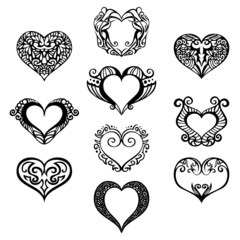Obraz na płótnie Canvas Set of doodly hand drawn hearts design elements