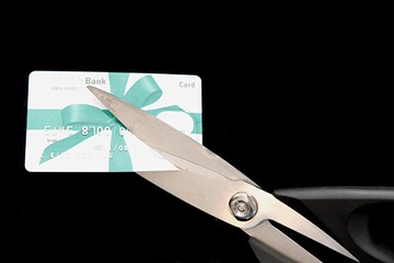 scissors cutting credit card