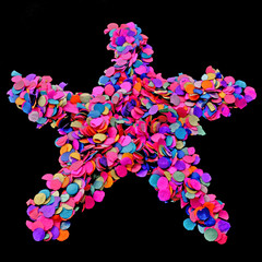 confettis disposés en étoile sur fond noir