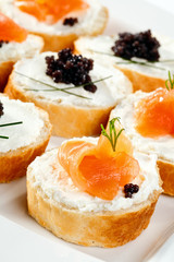 Mini sandwiches - bagel with cream cheese,  salmon, caviar