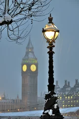 Foto op Canvas Dolphin lamp standard, South Bank, Thames, London, in the snow © photomic