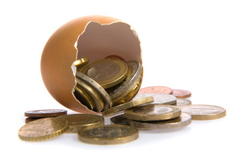 Egg with money on white. See portfolio for similar Images