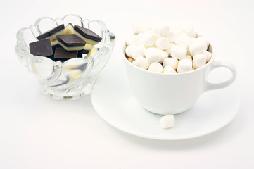 Dark chocolate with marshmallows on top plus sweets.