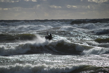 kiteboarding in baltic stormy sea