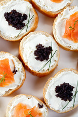 Mini sandwiches - bagel with cream cheese,  salmon, caviar