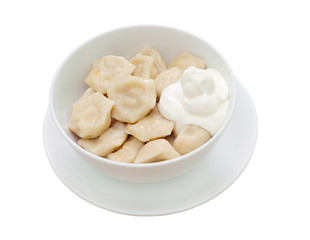 Meat dumplings  with sour cream