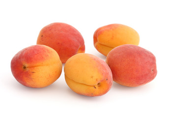 Fresh apricots isolated on white