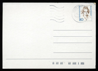 Blank postcard with stamp and postage meter