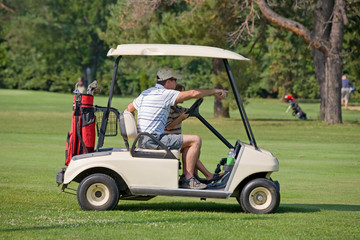 Father and Son in Golf Cart