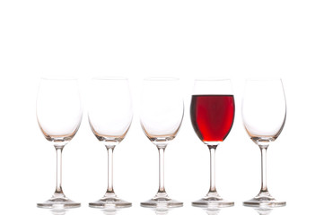 Glasses with red wine on white background