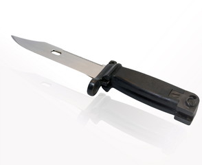 Military knife isolated on white with reflection.