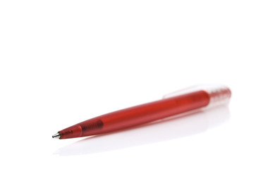 Red pen on white ground