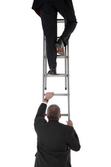 Two businessmen on a ladder
